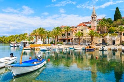 Fishing boats in Splitska village with beautiful port, Brac island, Croatia