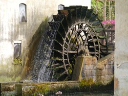 The carriage wheel of a water mill in Portogruaro a town on the river Lemene in the Province Venice in Veneto in Italy