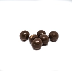 Chocolate balls loose, isolated on the white background.