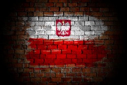 Flag of Poland painted on a brick wall in an urban location