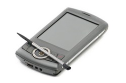 Old style PDA smartphone on isolated white background.