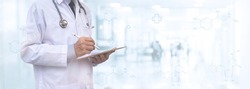 Healthcare and medical, telemedicine, medical technology concept. Medicine doctor with stethoscope using digital tablet computer with blurred hospital and patient background
