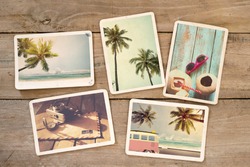 Summer photo album of remembrance and nostalgia on wood table. Photography from beach vacation. instant photo camera - vintage postcards and retro styles