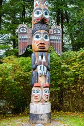 Kadjuk Bird Totem Pole at Totem Bight State Historical Park, Ketchikan, Alaska. Native American tradition. Totem animals act as guardian spirits.