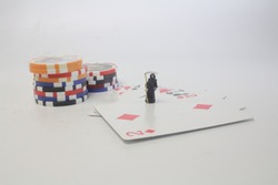 mini figure with Poker cards gambling chips 