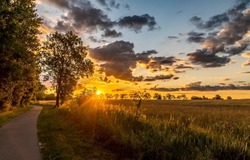 Sunrise over the countryside landscape. Countryside at dawn. Rural sunrise landscape. Nature at dawn