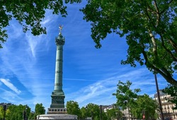France, Paris, June 2022. Place de la Bastille, highlighted the column of Juillet, in memory of the revolution of 1830. The golden winged statue stands out on the top