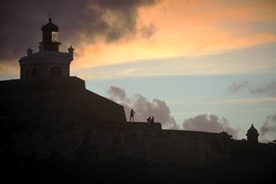Silhouette image of Castillo San Felipe del Morro, a 16th-century fortress located in San Juan, Puerto Rico, designated as UNESCO World Heritage Site in 1983.