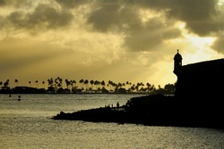 Sunset over the historical fortress surrounding the city of Old San Juan, Puerto Rico
