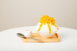Mango Japanese shaved ice.
Snow ice with Mango toping and milk.
