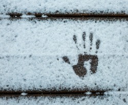 Hand print on the snow 