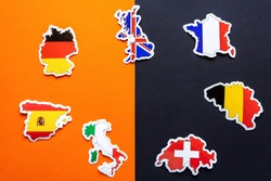 Maps of Great Britain, France, Germany, Italy, Spain, Belgium, Switzerland with flags on double black and orange background. Stop coronavirus in Europe. Covid-19 outbreak, pandemic concept