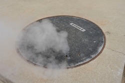 Steam coming out of manhole cover