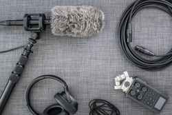 Overhead view of professional digital audio recording gear and microphone.