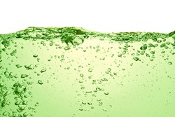 green soda drink with bubbles
