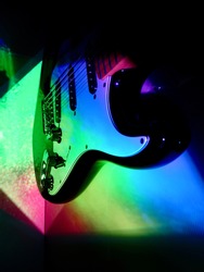  electric guitar in the color stage light                              