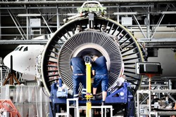 Jet engine remove from aircraft (airplane) for maintenance at aircraft hangar.Jet engine maintenance and change part by aircraft technician .