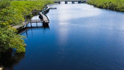 Low aerial view of the boardwalk on the St Lucie River in Port St Lucie Florida