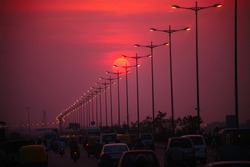 Street view, Highway traffic in sunset at new delhi, India