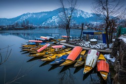 Beautiful view of the colorful Shikara boats floating on Dal Lake, Srinagar, Kashmir, India.