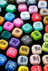 A set of markers for drawing in different colors for sketching with markings