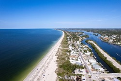 Aerial Drone Nokomis Beach. Gulf of Mexico on Casey Key in Nokomis Florida, United States. Red tide water