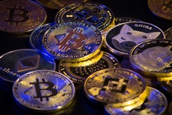 Pile of cryptocurrencies over dark background