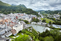 Lourdes, France. The Sanctuary of Our Lady of Lourdes and river Gave de Pau. French city is located in southern France in the foothills of the Pyrenees mountains