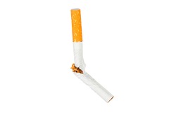Broken cigarette fly in air on isolated background. Conception of combating smoking.