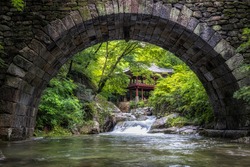 Seungseongyo bridge and the famous Korean pavilion over the creek water. Taken in Seonamsa temple, Suncheon, South Korea