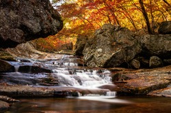 Cascading waterfall in Jiri Mountain in South Korea during the autumn season.