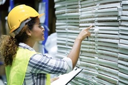 Worker inventory inspect staff checking and inspect package box with checklist in warehouse factory storage products shipment distributor logistic supply for counting and management