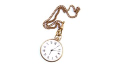 old pocket watch on a white background