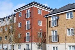 Modern two and three storey apartment blocks in the Leggatts Green area of Watford, Hertfordshire, UK