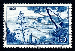 Ankara, Turkey - 3 June 2021: A France postage stamp shows Nice urban area located in the French Riviera, on the south east coast of France on the Mediterranean Sea. Circa 1955...