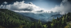 panoramic view over a mystical valley in the wild Retezat National Park, Romania