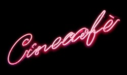 Neon sign of a Cine-cafe. Pink glow.