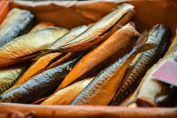 Smoked fish on the street market. Close-up.