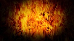 Fire blaze on a black background. Abstract blaze, fire, flame texture for banner, background and textured