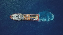 Aerial view of a offshore vessel or barge. The vessel is to support and assist subsea development activity offshore.
