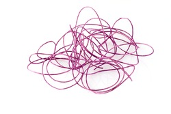 Lilac-colored tangled lace on white background