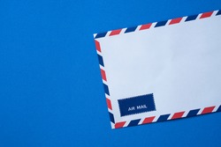 air mail envelope on blue background