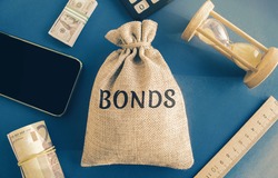 Money bag with the word Bonds. A bond is a security that indicates that the investor has provided a loan to the issuer. Equivalent loan. Unsecured and secured bonds.
