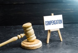 Compensation and judge's gavel. Award of moral financial compensation for caused damage. Lawyer services. Workers rights protection. Raising wages. Determination of payments by a court order.