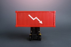 Red shipping container with down arrow. Decrease in imports and exports of goods. Trade traffic decreasing. Production fall. Lowering transportation prices. Decline in profits. Low shipping rates.
