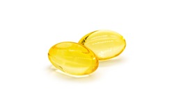 Close up of oil filled capsule (soft gel) suitable for presenting food supplements: fish oil, omega 3, omega 6, omega 9, vitamin A, vitamin D, vitamin D3, vitamin E, evening primrose oil, borage oil