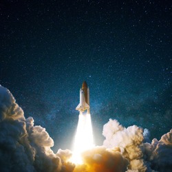 Spacecraft flies up into the starry sky. Rocket with smoke flies into space. Space Shuttle