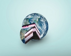 Planet earth cake, concept. Blue planet earth pie pieces on blue background. Food and sweets creative idea. Sugar and life