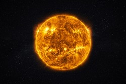Real close up photo of the sun. Burning star with plasma emissions in the starry sky. The Sun star in the solar system