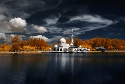 Image Of Mosque Tengku Tengah Zaharah Kuala Ibai Terengganu By The Lakeside Viewed In Infrared. custom white balance applied due to infrared image